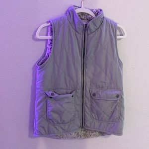 grey zip up vest